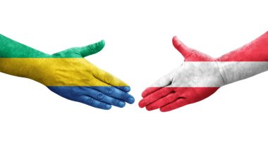 Ellerinde Avusturya ve Gabon bayrakları arasında el sıkışma, izole şeffaf görüntü.