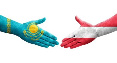 Avusturya ve Kazakistan bayrakları arasındaki el sıkışma ellerinde resmedilmiş şeffaf görüntü.