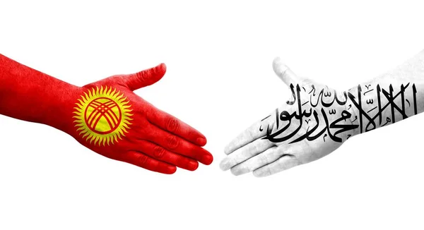 アフガニスタンとキルギスタンの旗の間の握手手に描かれた孤立した透明なイメージ — ストック写真