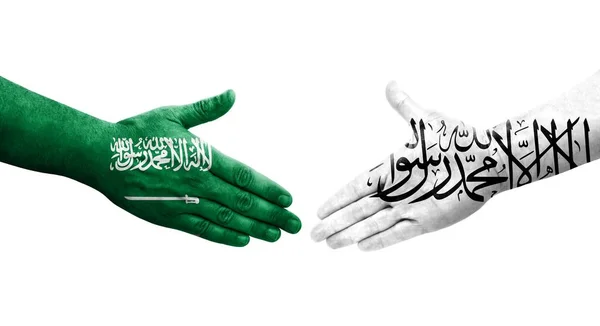 アフガニスタンとサウジアラビアの間の握手手に描かれた旗 孤立した透明なイメージ — ストック写真