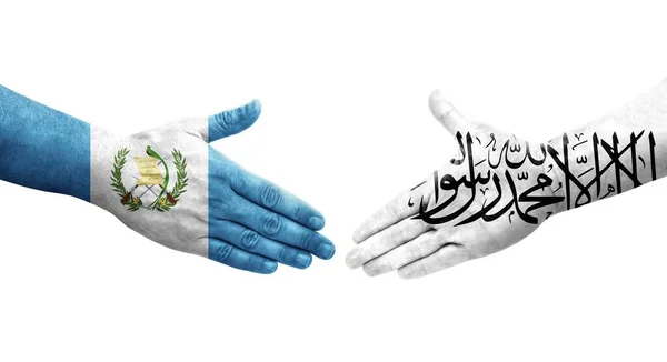 アフガニスタンとグアテマラの旗の間の握手手で描かれた孤立した透明なイメージ — ストック写真