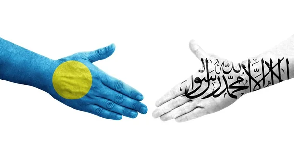 Handdruk Tussen Afghanistan Palau Vlaggen Geschilderd Handen Geïsoleerd Transparant Beeld — Stockfoto