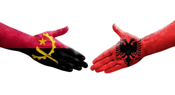 Apretón Manos Entre Albania Angola Banderas Pintadas Las Manos Imagen — Foto de Stock