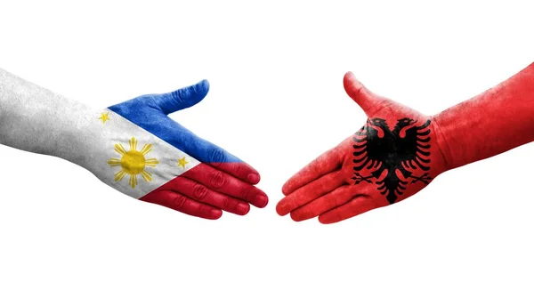 Uścisk Dłoni Między Albanią Filipinami Flagi Malowane Rękach Odizolowany Przezroczysty — Zdjęcie stockowe