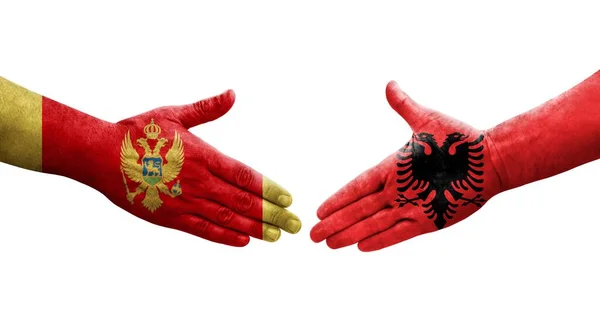 Рукостискання Між Албанією Чорногорією Прапори Намальовані Руках Ізольоване Прозоре Зображення — стокове фото