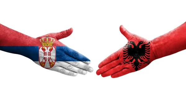 Χειραψία Μεταξύ Αλβανίας Και Σερβίας Σημαίες Ζωγραφισμένες Στα Χέρια Απομονωμένη — Φωτογραφία Αρχείου