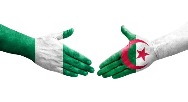 Χειραψία Μεταξύ Αλγερίας Και Νιγηρίας Σημαίες Ζωγραφισμένα Στα Χέρια Απομονωμένη — Φωτογραφία Αρχείου