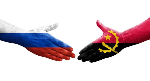 Handdruk Tussen Angola Rusland Vlaggen Geschilderd Handen Geïsoleerd Transparant Beeld — Stockfoto