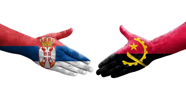 Mano Apretada Entre Las Banderas Angola Serbia Pintadas Las Manos — Foto de Stock