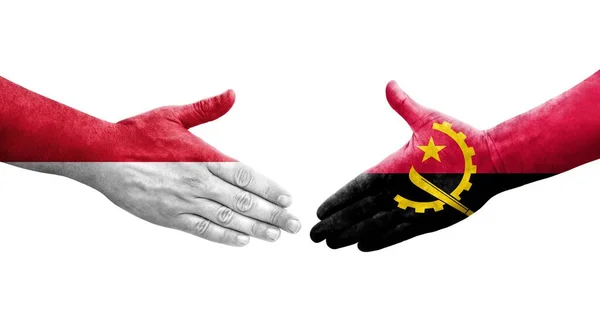 安哥拉和摩纳哥之间的握手手绘国旗 孤立透明的形象 — 图库照片