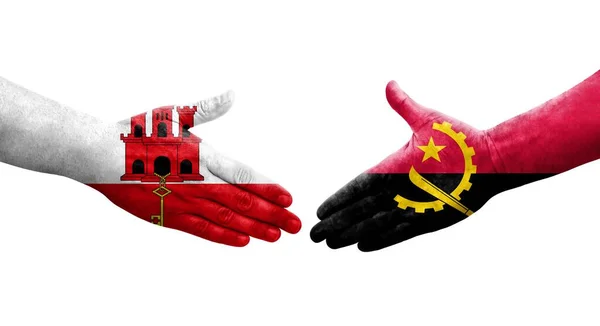 Рукопожатие Между Флагом Анголы Гибралтара Нарисованное Руках Изолированное Прозрачное Изображение — стоковое фото