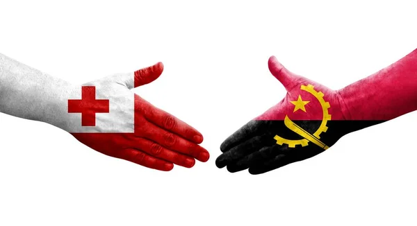 Handdruk Tussen Angola Tonga Vlaggen Geschilderd Handen Geïsoleerd Transparant Beeld — Stockfoto