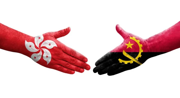 Handdruk Tussen Angola Hong Kong Vlaggen Geschilderd Handen Geïsoleerd Transparant — Stockfoto