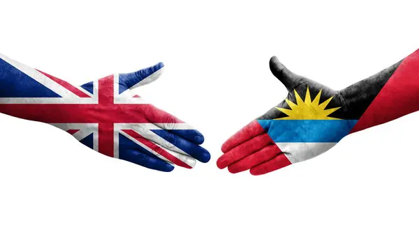 Handdruk Tussen Antigua Barbuda Het Verenigd Koninkrijk Vlaggen Geschilderd Handen — Stockfoto