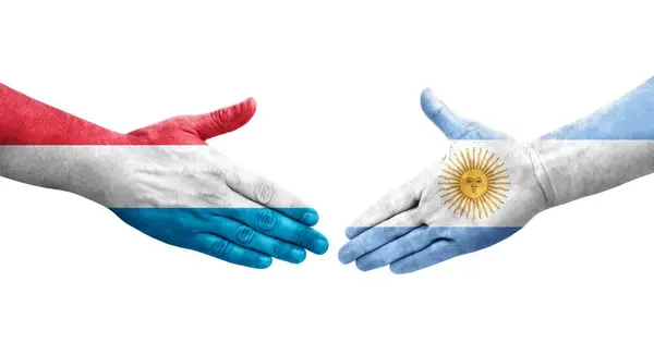 Χειραψία Μεταξύ Αργεντινής Και Λουξεμβούργου Σημαίες Ζωγραφισμένες Στα Χέρια Απομονωμένη — Φωτογραφία Αρχείου