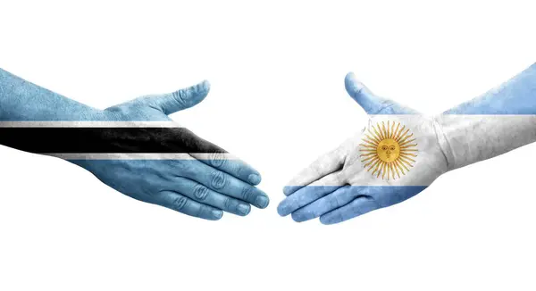 Apretón Manos Entre Argentina Botswana Banderas Pintadas Las Manos Imagen — Foto de Stock