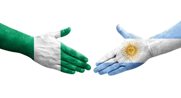 Χειραψία Μεταξύ Αργεντινής Και Νιγηρίας Σημαίες Ζωγραφισμένα Στα Χέρια Απομονωμένη — Φωτογραφία Αρχείου