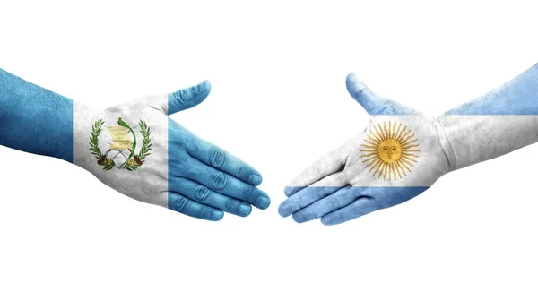 Рукопожатие Между Флагом Аргентины Гватемалы Нарисованное Руках Изолированное Прозрачное Изображение — стоковое фото