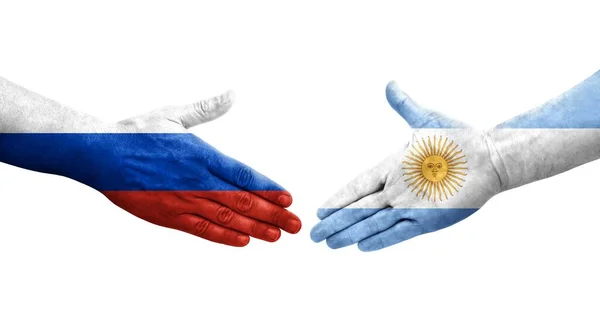 Рукопожатие Между Аргентиной Россией Нарисованными Руках Флагами Изолированное Прозрачное Изображение — стоковое фото