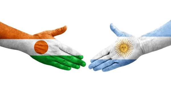 阿根廷和尼日尔的国旗手绘握手 孤立透明的图像 — 图库照片
