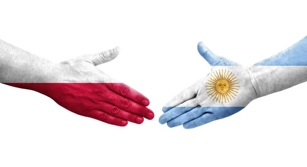 Рукопожатие Между Аргентиной Польшей Раскрашенные Руках Флаги Изолированное Прозрачное Изображение — стоковое фото