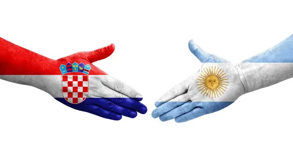 Handslag Mellan Argentina Och Kroatien Flaggor Målade Händer Isolerad Transparent — Stockfoto