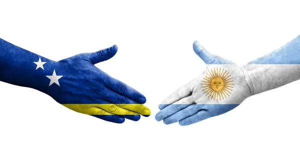 Händedruck Zwischen Argentinien Und Curaçao Fahnen Auf Hände Gemalt Isoliertes — Stockfoto