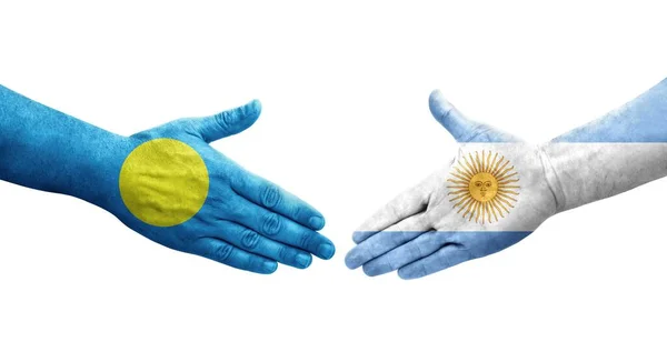 Рукопожатие Между Флагом Аргентины Флагом Палау Нарисованное Руках Изолированное Прозрачное — стоковое фото