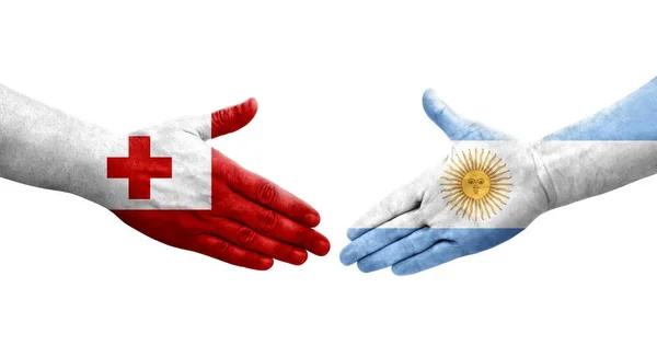 Händedruck Zwischen Argentinien Und Tonga Flaggen Auf Hände Gemalt Isoliertes — Stockfoto