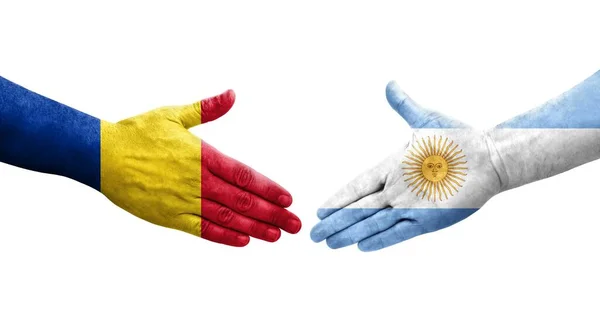 Mano Apretada Entre Las Banderas Argentina Rumanía Pintadas Las Manos — Foto de Stock
