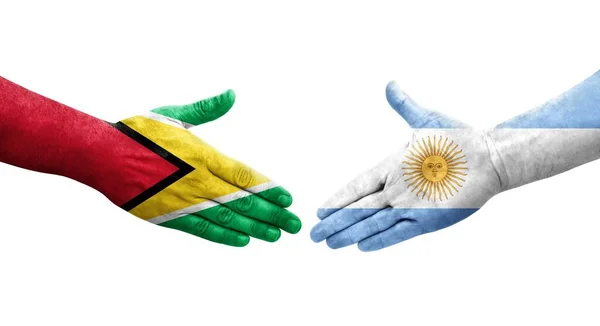 Mano Apretada Entre Las Banderas Argentina Guyana Pintadas Las Manos —  Fotos de Stock