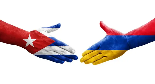 stock image Handshake between Armenia and Cuba flags painted on hands, isolated transparent image.