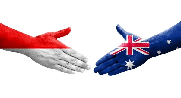 Apretón Manos Entre Australia Indonesia Banderas Pintadas Las Manos Imagen — Foto de Stock