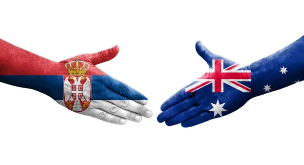 Handdruk Tussen Australië Servië Vlaggen Geschilderd Handen Geïsoleerd Transparant Beeld — Stockfoto