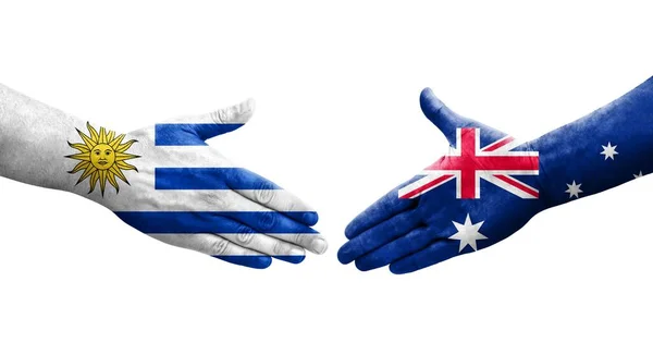 Händedruck Zwischen Australischen Und Uruguayischen Flaggen Auf Hände Gemalt Isoliertes — Stockfoto