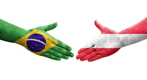 Ellerinde Avusturya Brezilya Bayrakları Arasında Sıkışma Izole Şeffaf Görüntü — Stok fotoğraf