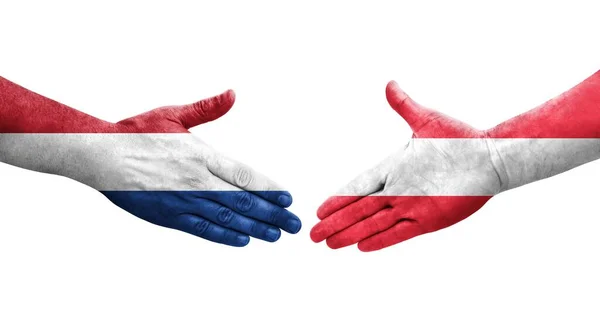 오스트리아와 네덜란드의 국기가 손으로 그려지면서 이미지를 손으로 흔드는 — 스톡 사진