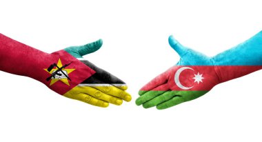 Ellerinde Azerbaycan ve Mozambik bayrakları arasında el sıkışma, izole şeffaf görüntü.