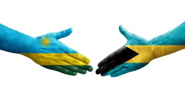 Bahamalar ve Ruanda bayrakları arasındaki el sıkışma ellerinde resmedilmiş şeffaf görüntü.