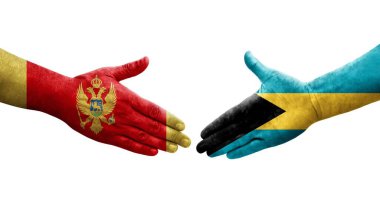 Bahamalar ve Karadağ bayrakları arasında el sıkışma, izole şeffaf görüntü.