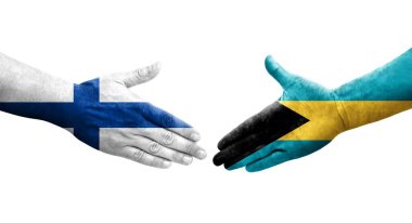 Bahamalar ve Finlandiya bayrakları arasındaki el sıkışma, izole edilmiş şeffaf görüntü.