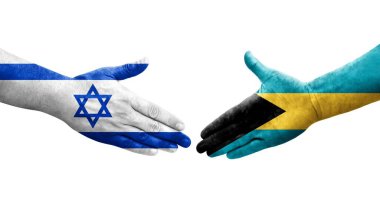 Bahamalar ve İsrail bayrakları arasında el sıkışma, izole şeffaf görüntü.