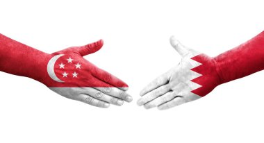 Bahreyn ve Singapur bayrakları arasındaki tokalaşma elleri boyalı, izole şeffaf görüntü.