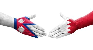 Ellere boyanmış Bahreyn ve Nepal bayrakları arasındaki el sıkışma, izole şeffaf görüntü.
