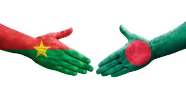 Bangladeş ve Burkina Faso bayrakları arasındaki tokalaşma elleri boyalı, izole şeffaf görüntü.