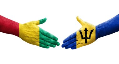 Ellerinde Barbados ve Gine bayrakları arasında el sıkışma, izole şeffaf görüntü.