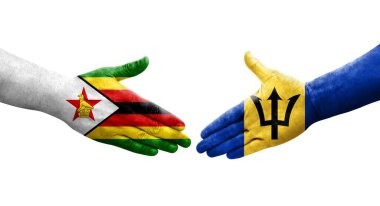 Ellerinde Barbados ve Zimbabwe bayrakları arasında el sıkışma, izole şeffaf görüntü.