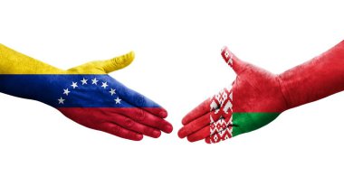 Belarus ve Venezuela bayrakları arasındaki tokalaşma elleri boyalı, izole şeffaf görüntü.