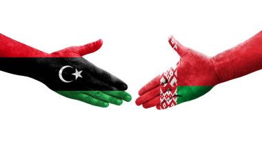 Belarus ve Libya bayrakları arasındaki el sıkışma, izole edilmiş şeffaf görüntü.