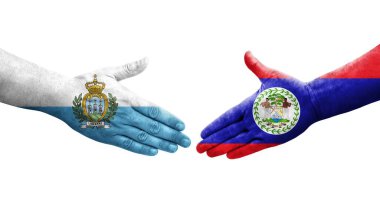 Belize ve San Marino bayrakları arasındaki el sıkışma..